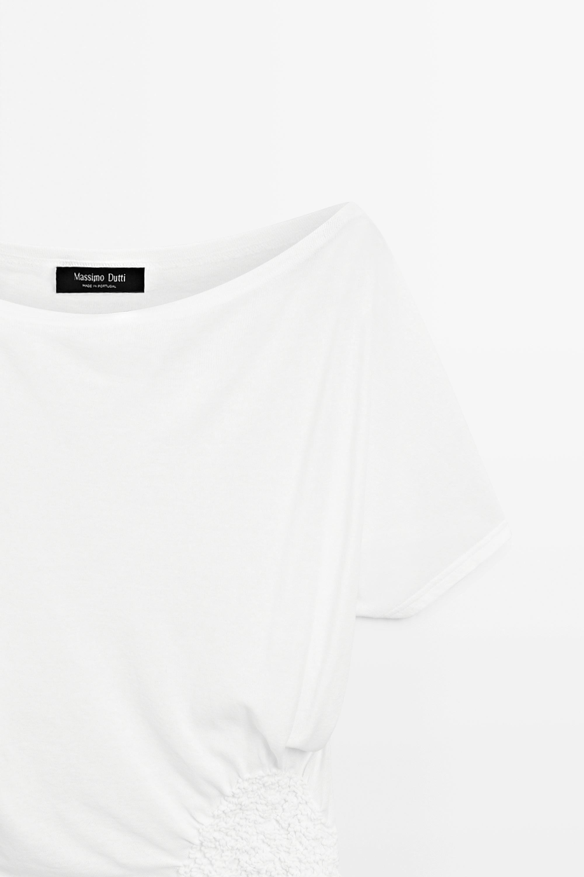 Asymmetric top with embroidered detail